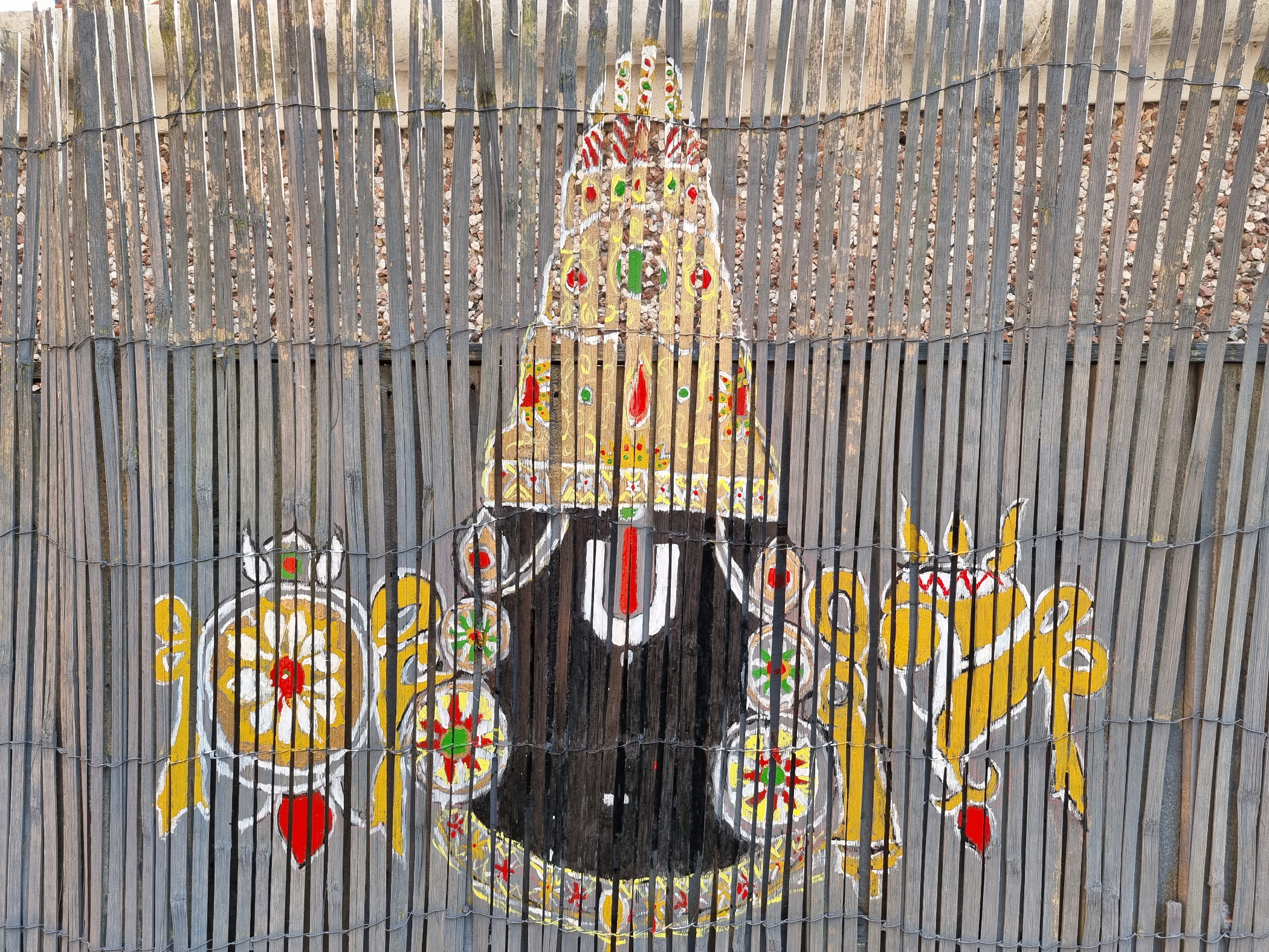 Painting on fence of Lord Balaji or Venkateshwara