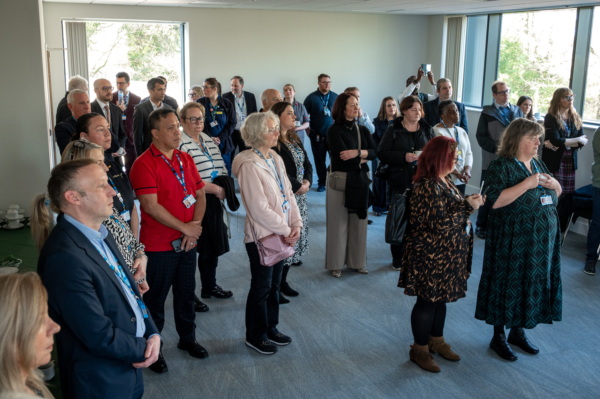 a room of 25 people attending an event 