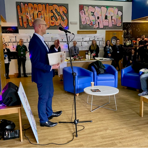 CEO Chris Oliver speaks at an event.