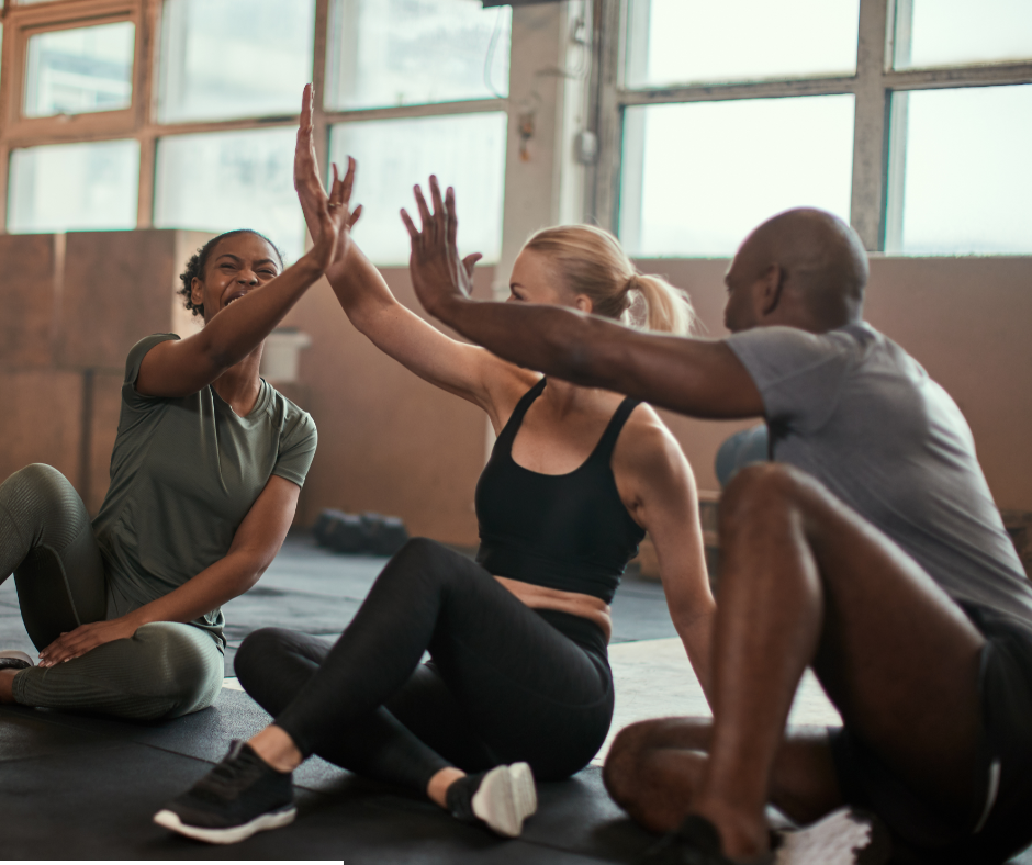 friends exercising with floor mat exercise clapping hands